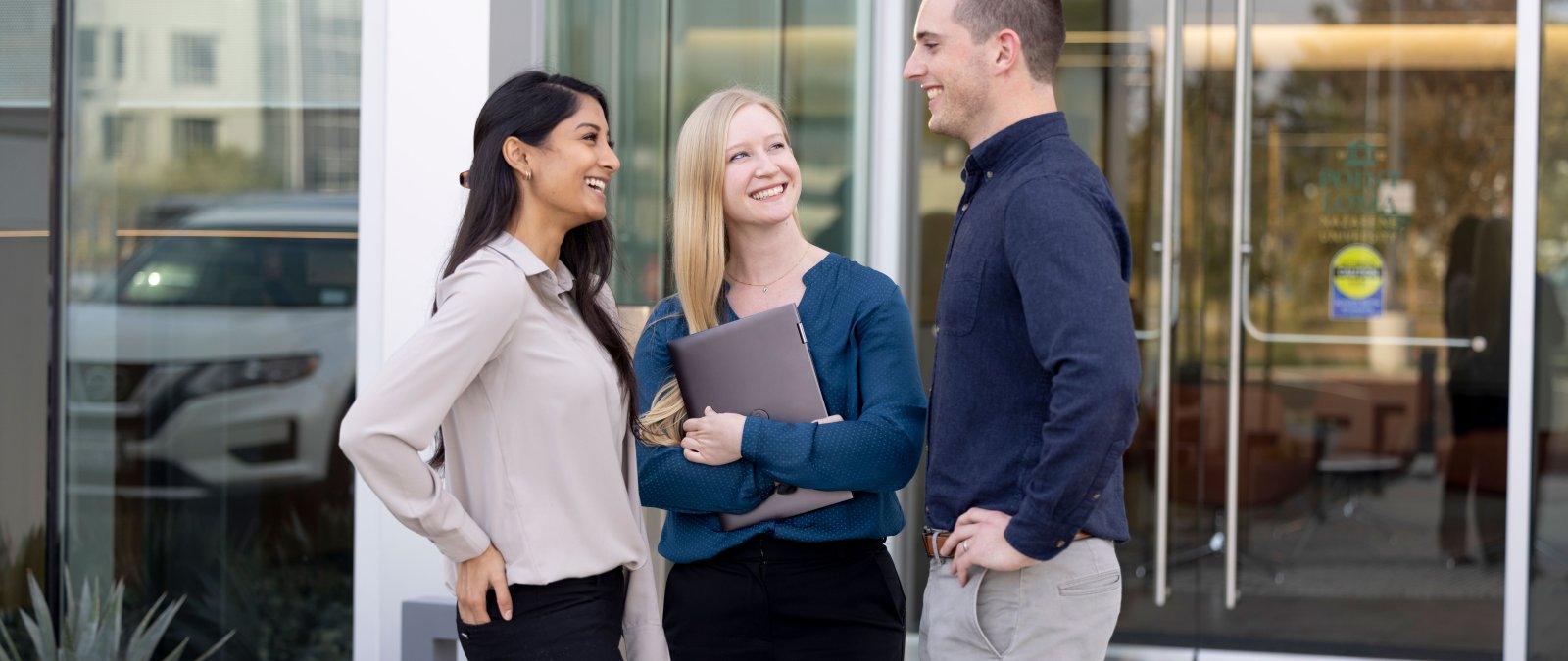 3 students talking