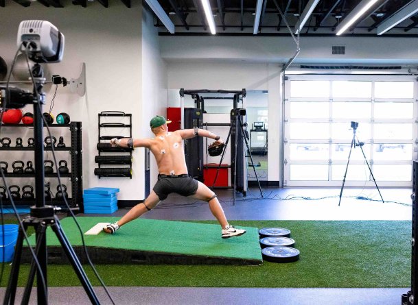 PLNU pitcher throws at the pitching lab