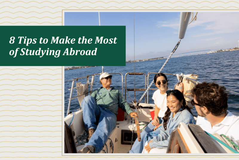 8 Tips to make the most of studying abroad: Students together on a sailboat laughing