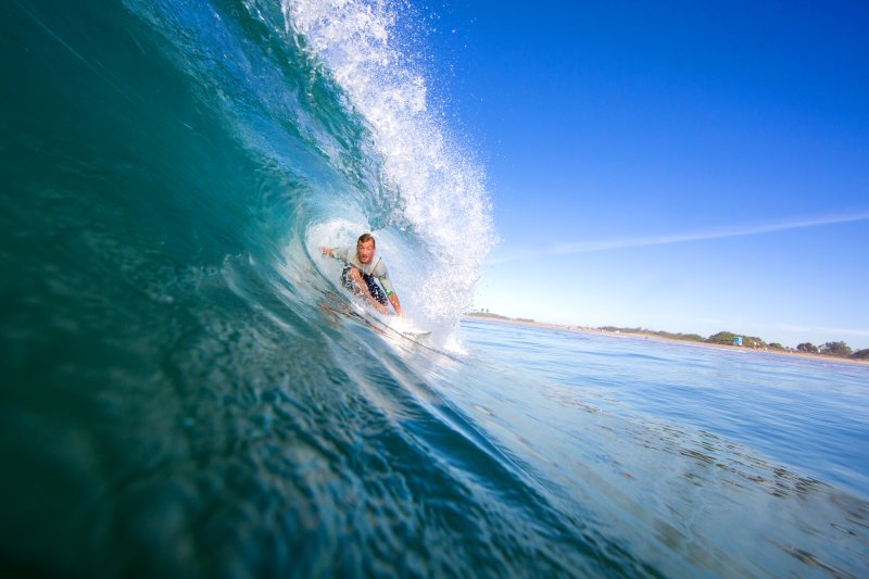 Person surfing on wave 