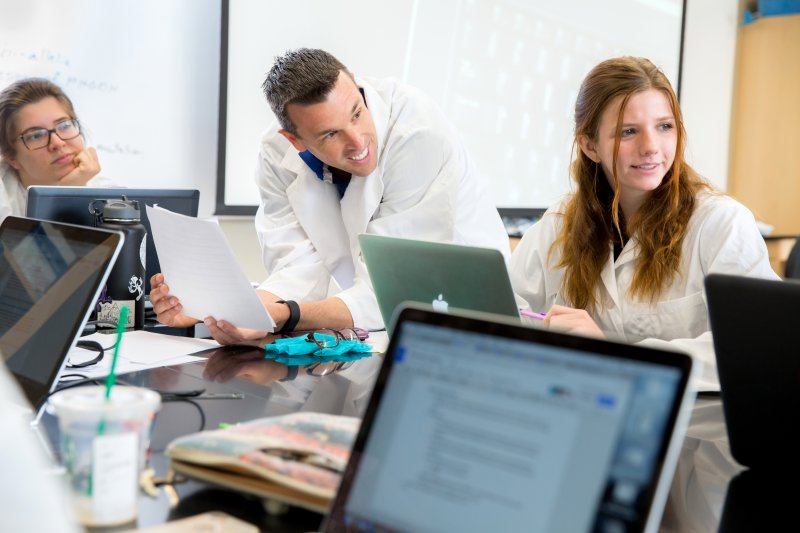 Mike Dorrell with students in class 