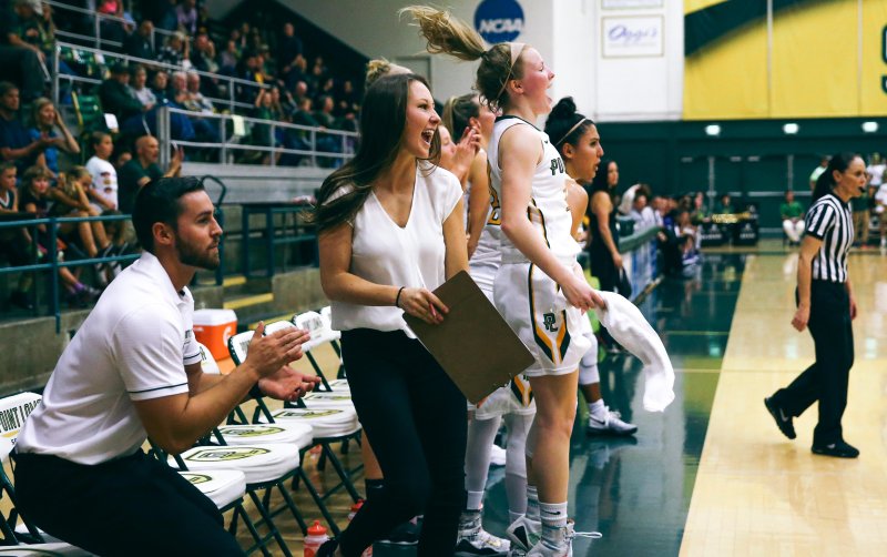 Basketball coach cheering 