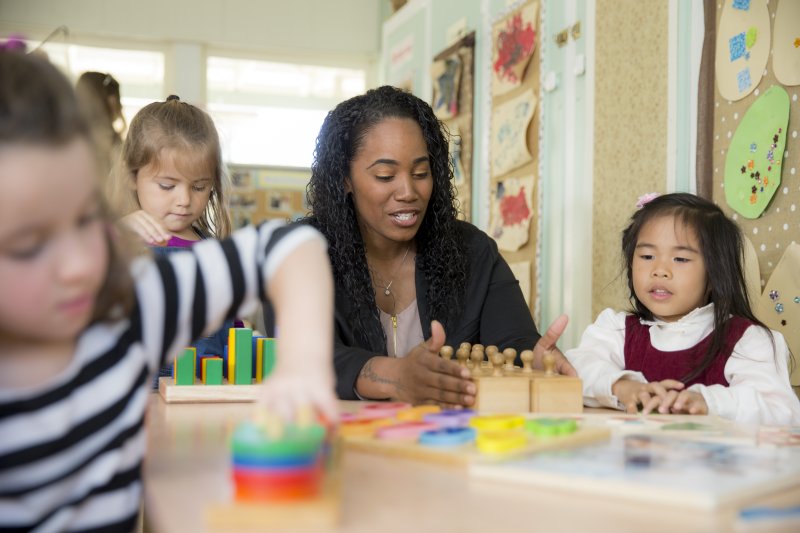 teacher helping a student 