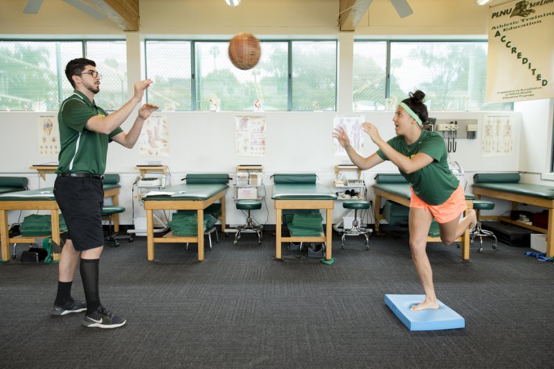 Exercise Science Coach working with an athlete 