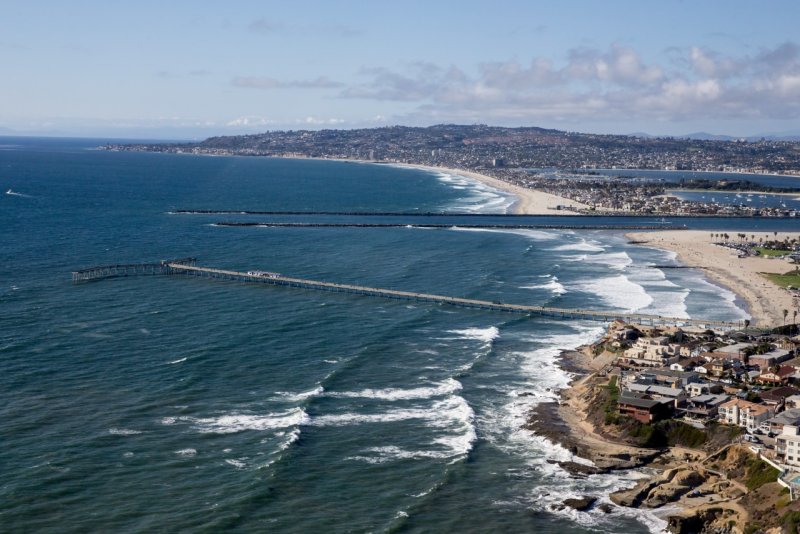 Aerial view of waves crashing on Ocean Beach, San Diego.