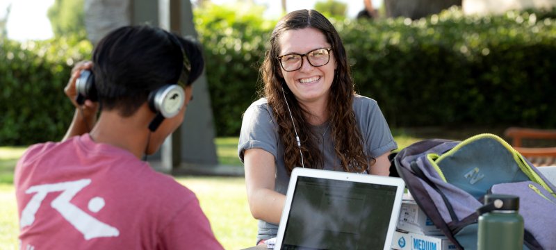 Two students doing schoolwork 