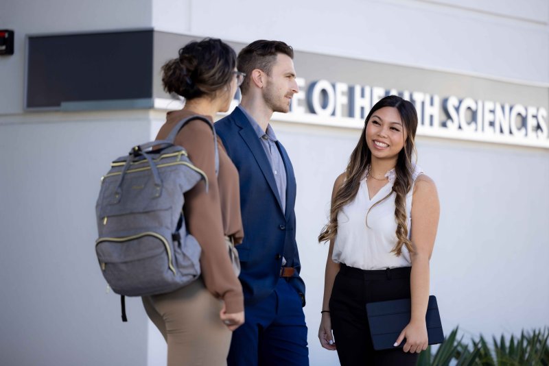Image of 3 students standing infront of Balboa Campus