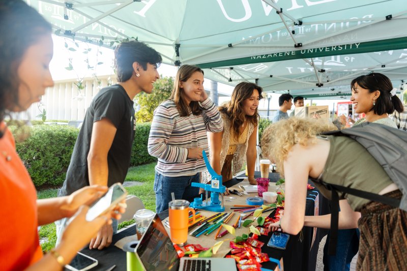 Students gathered at club booth
