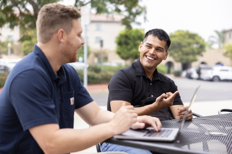Military students sitting at a table in Liberty Station