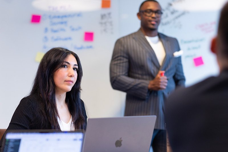 Two PLNU students present in class presentation. 