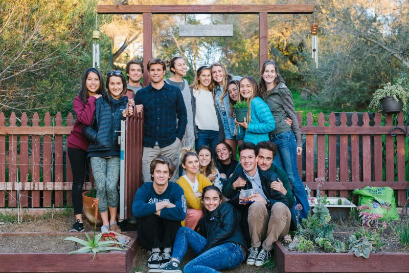 People smiling for club photo 