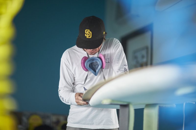Chris Christenson shaping a board