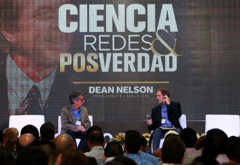 Dean Nelson speaking at a conference in Columbia