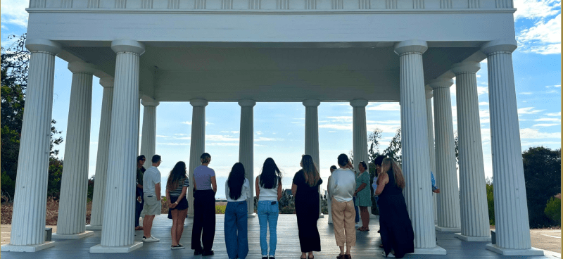 Photo of student in PLNU's Greek Theatre for MACC Online’s inaugural New Student Orientation, August 23, 2025.
