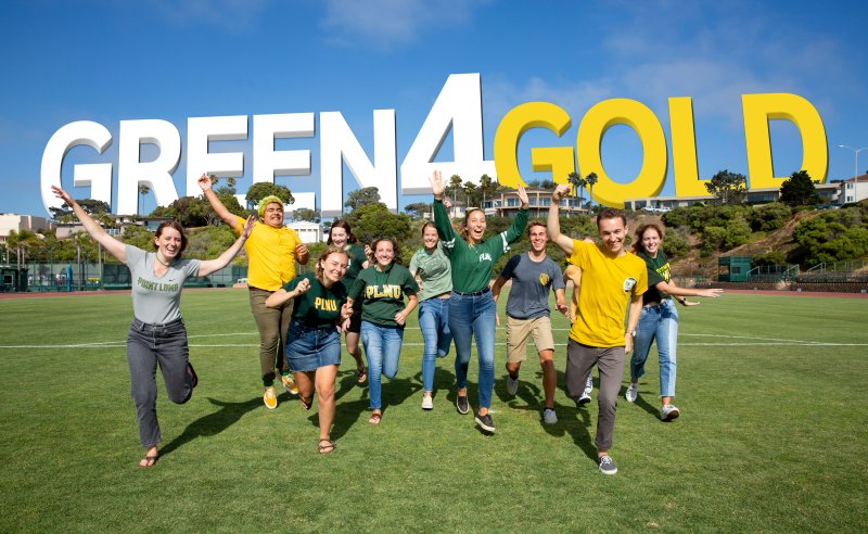students running on the soccer fielf for Green4Gold fundraiser