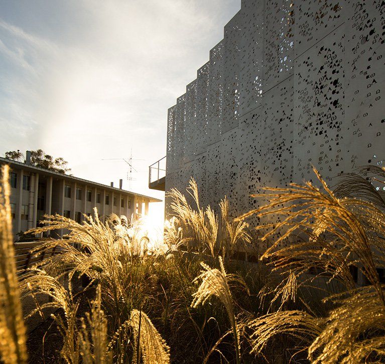 A sunset golden hour view of the PLNU science complex.