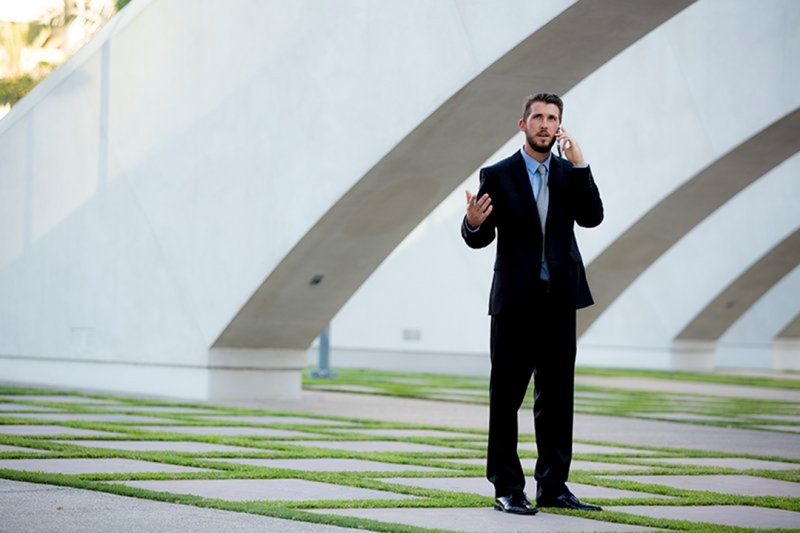 A businessman talks on the phone