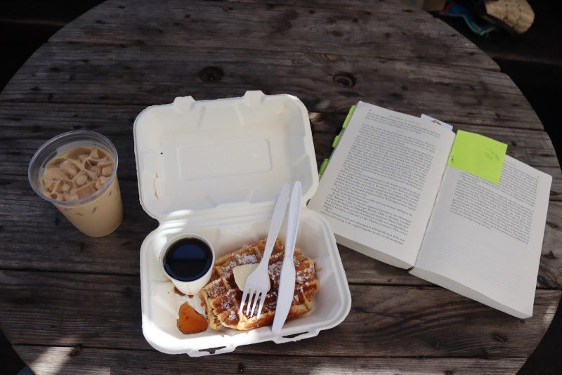 Coffee, waffles, and a textbook