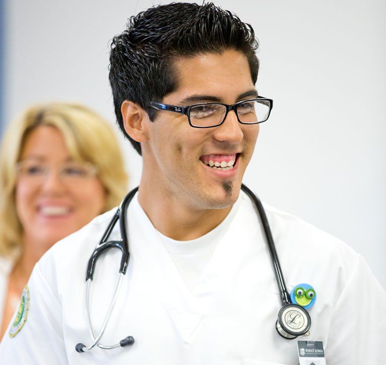 PLNU Nursing Student Smiling with Stethoscope Around His Neck