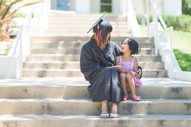Mom celebrating graduation with daughter