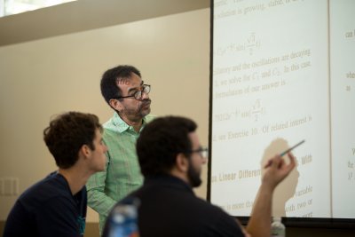 PLNU students in mathematics lecture with Professor Jesus Jimenez.
