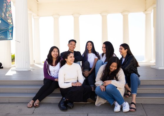 Undergraduate Students sitting in the Greek on campus