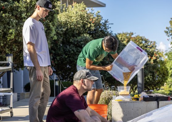 PLNU engineering students prepare materials and equipment for a senior engineering project.