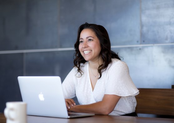 Female MBA student working on laptop