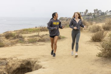 Two students jogging on Sunset Cliffs