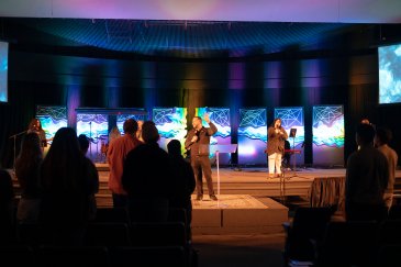 Brown Chapel worship session with students and spiritual leaders.
