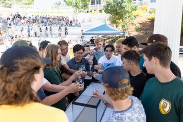 Students gathered for sand ceremony