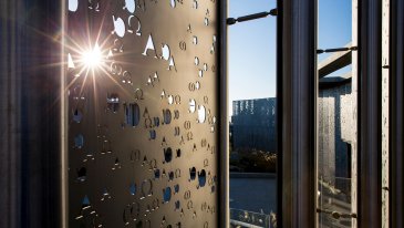 light Flares through the Alpha and Omega panels of Sator Hall
