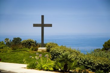 The PLNU cross overlooking the ocean.