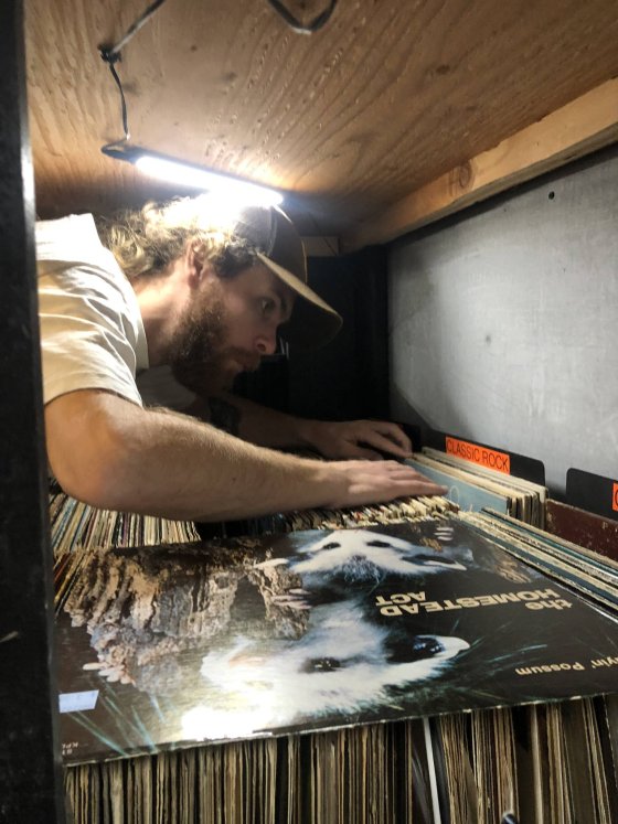 Student looking through vinyl music records