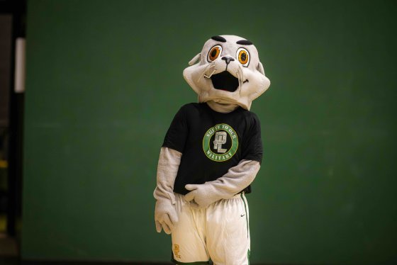 PLNU mascot Splash cheers on during basketball game.